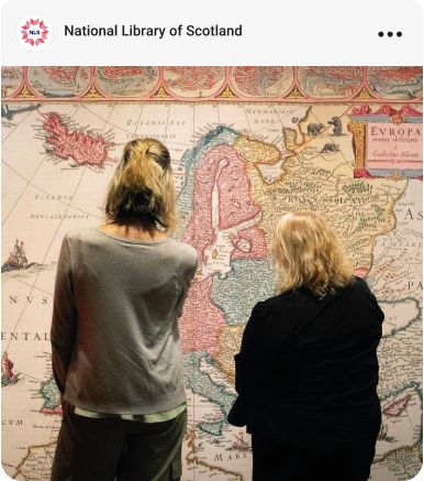 Social post example - 2 people looking at a map