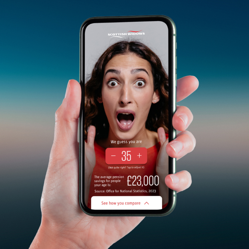 Woman looking shocked on phone screen while holding it