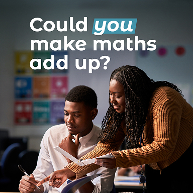 pupil sat at desk during a lesson and woman teacher leaning over to help with lesson
